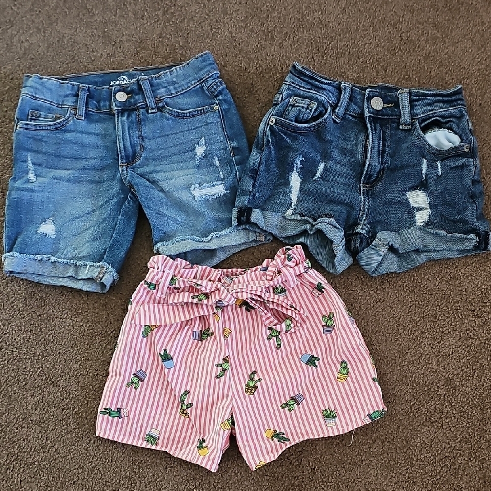 Striped Pink Kids Shorts with Pineapple Print, And Two Pairs Of Jean Shorts.